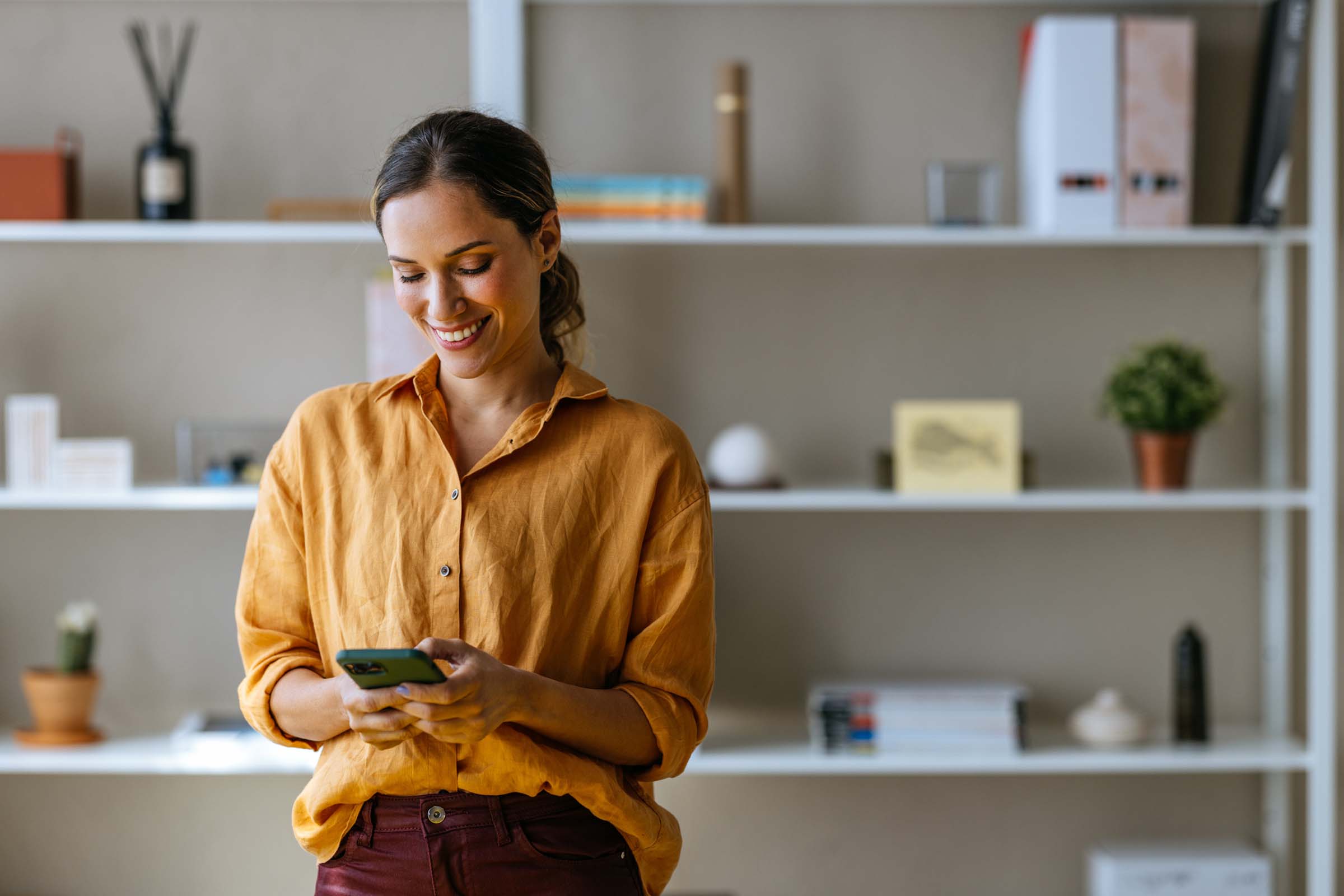 woman clicking on mobile