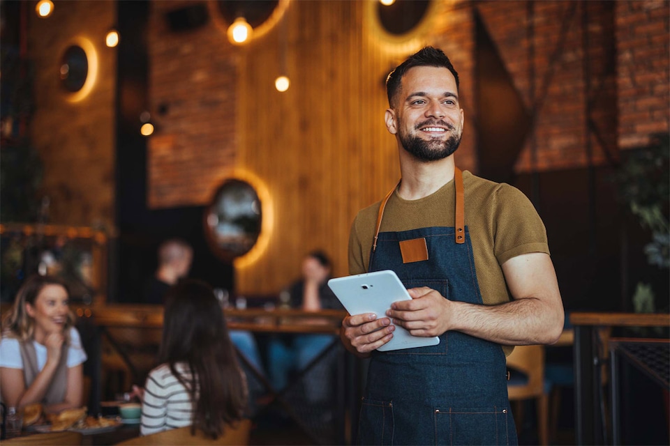 Employee shows example of how the POS terminal loan works