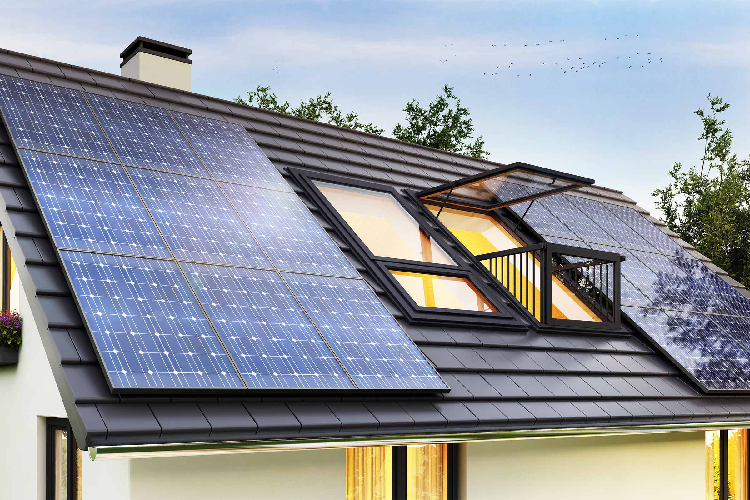 Imaxe dunha vivenda con paneis solares cubrindo o tellado